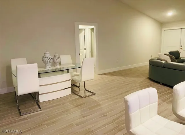 a room with furniture and a wooden floor