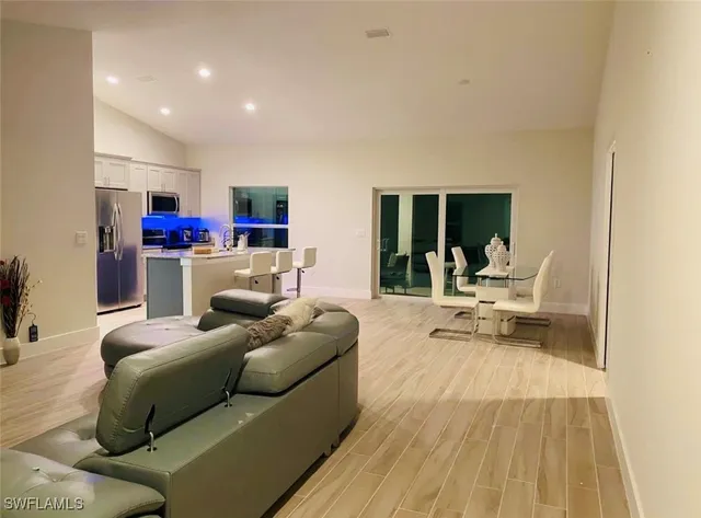 a living room with furniture and a couch