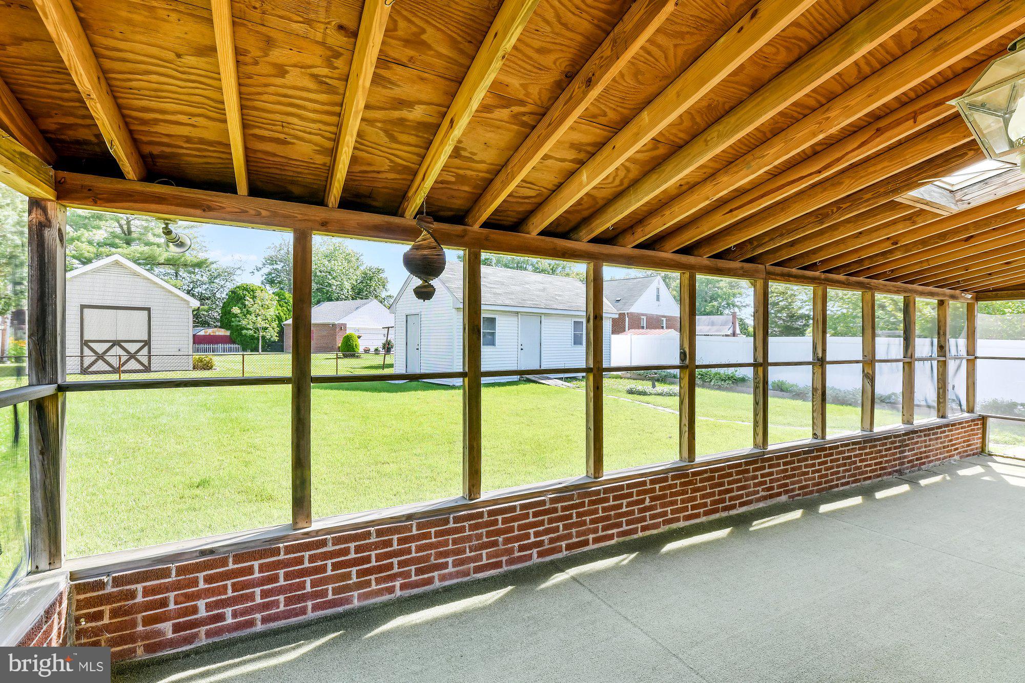 2812 5th Avenue Baltimore, MD 21234 - Photo 7 of 39 Fabulous Humongous Screened in Porch!