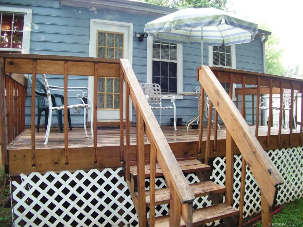 6007 Running Deer Road Charlotte, NC 28214 - Photo 17 of 23 front view of a house with a balcony