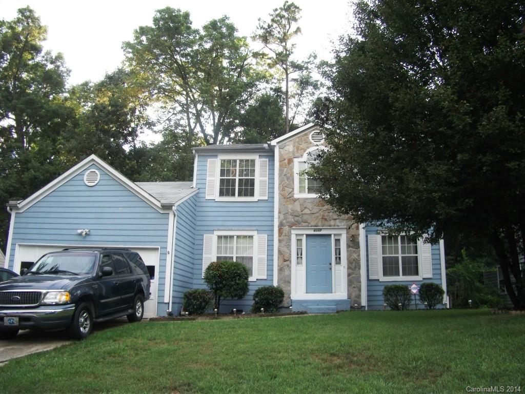 6007 Running Deer Road Charlotte, NC 28214 - Photo 22 of 23 a house view with a garden space