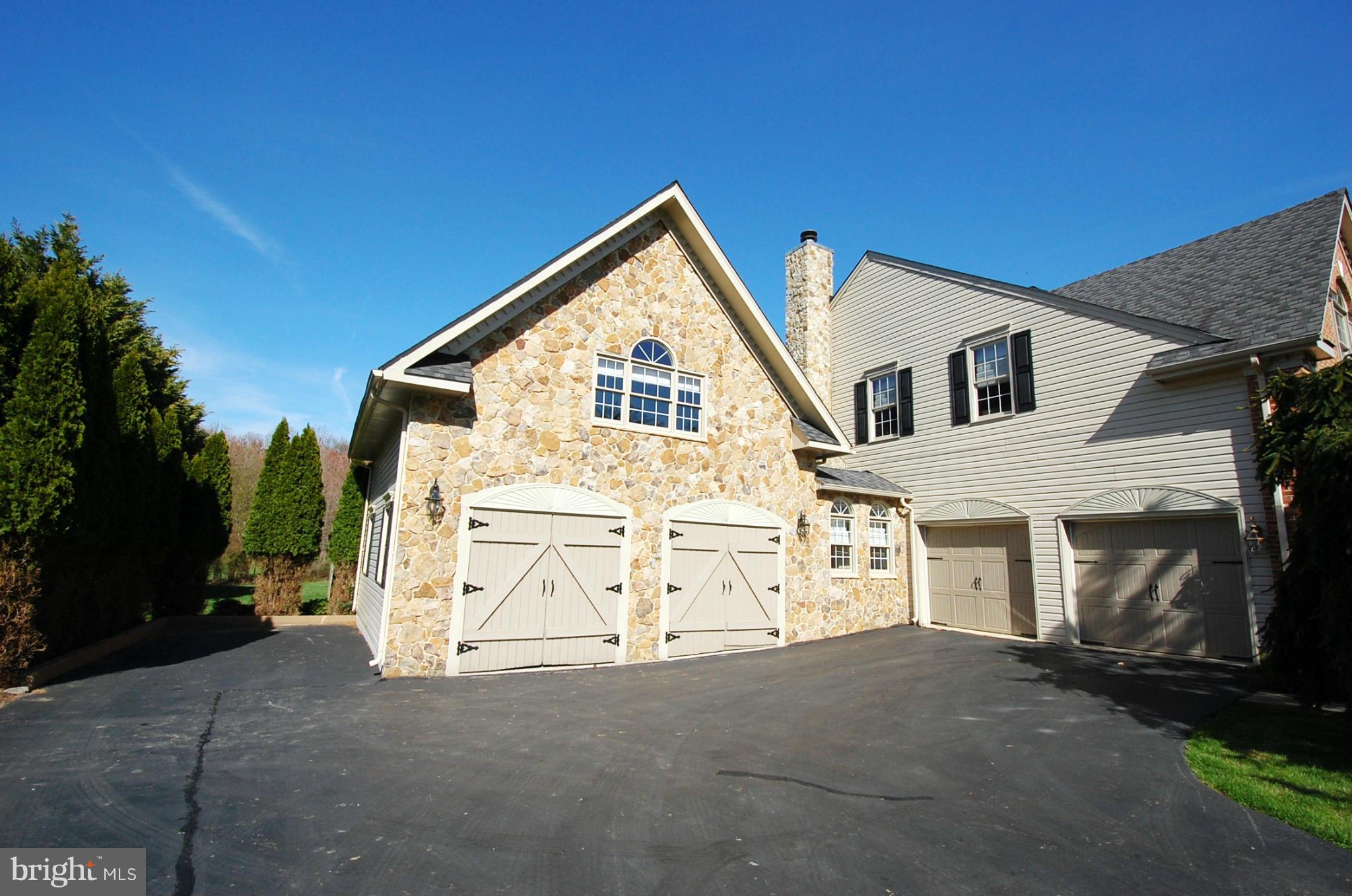 9609 Watkins Road Gaithersburg, MD 20882 - Photo 3 of 30 4 Car Attached Garage