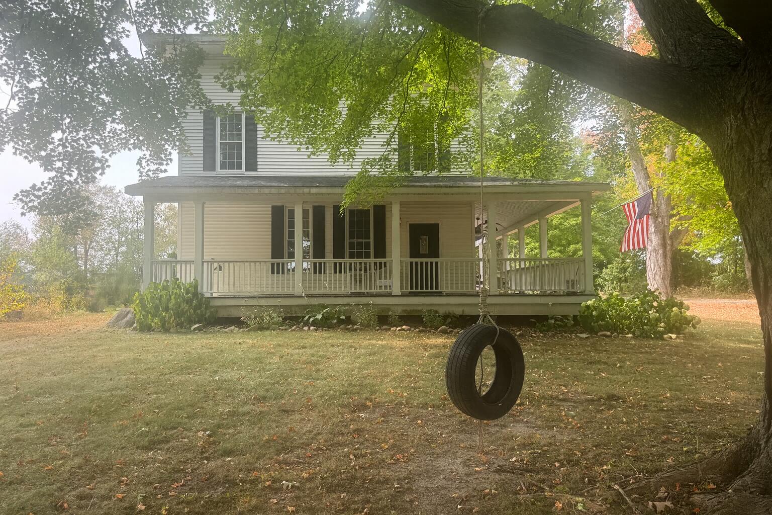 Classic Farmhouse with Tire Swing