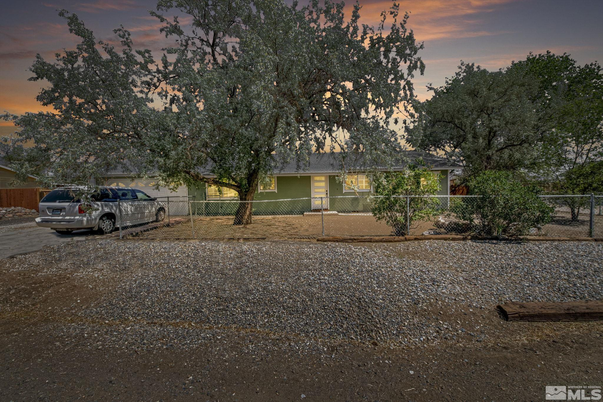 213 Ring Road Dayton, NV 89403 - Photo 2 of 40 a view of a house with a street