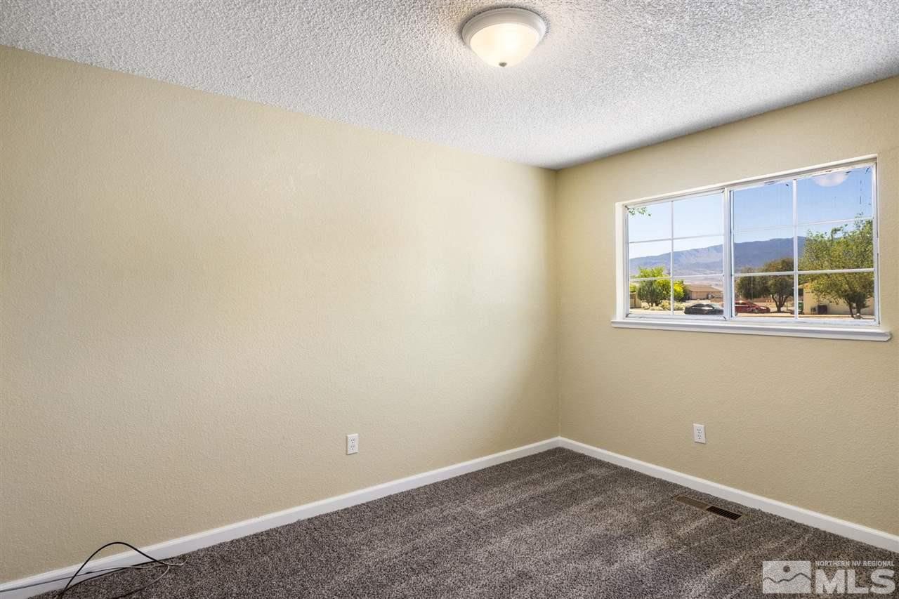 213 Ring Road Dayton, NV 89403 - Photo 21 of 40 an empty room with a window