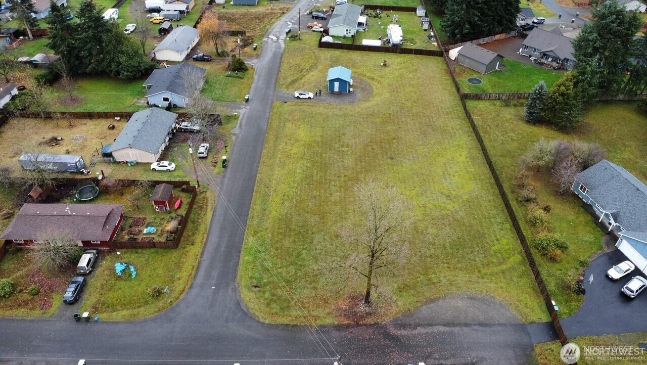 18905 Prairie Street Southwest Rochester, WA 98579 - Photo 5 of 7 an aerial view of a house with outdoor space lake view