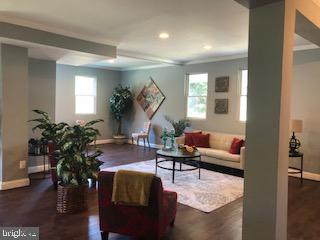 3713 Chatham Road Baltimore, MD 21215 - Photo 15 of 28 a living room with furniture potted plant and wooden floor