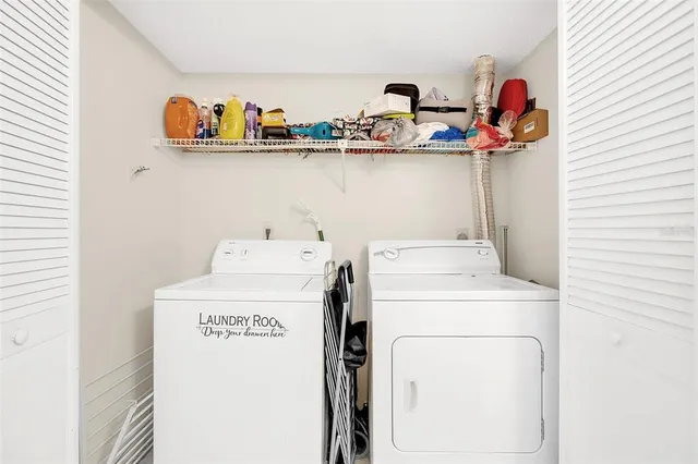 a utility room with dryer and washer