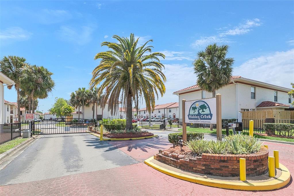 1612 Sandy Point Square, Unit 56 Orlando, FL 32807 - Photo 23 of 26 a view of a swimming pool with furniture