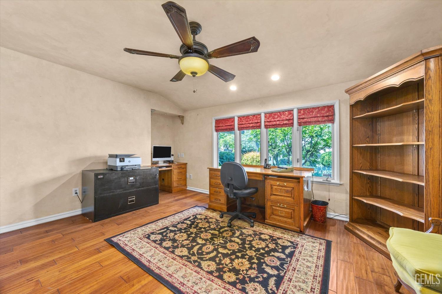 Undisclosed Address Bakersfield, CA 93313 - Photo 26 of 45 a living room with furniture and a window