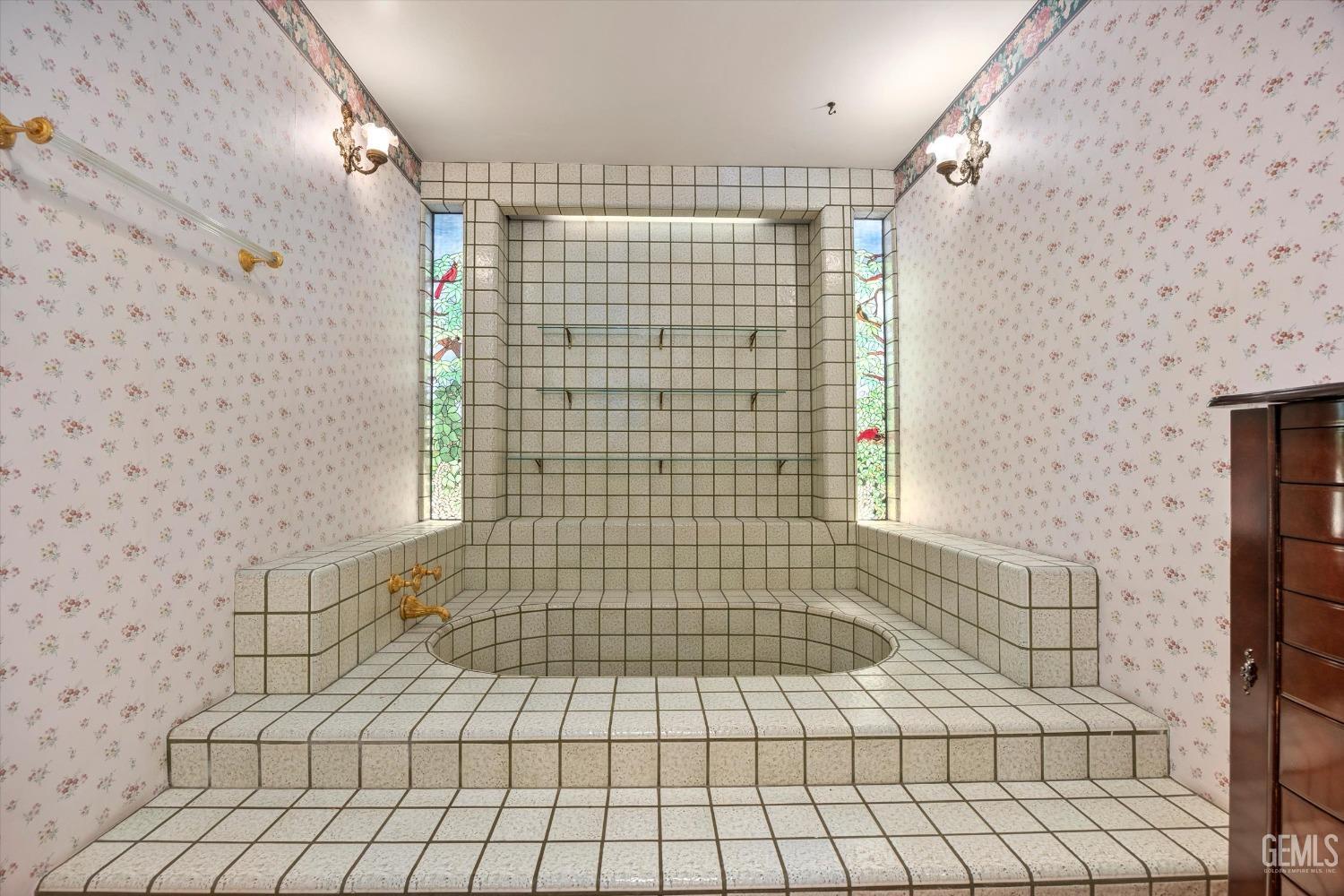 Undisclosed Address Bakersfield, CA 93313 - Photo 31 of 45 a bathroom with a shower