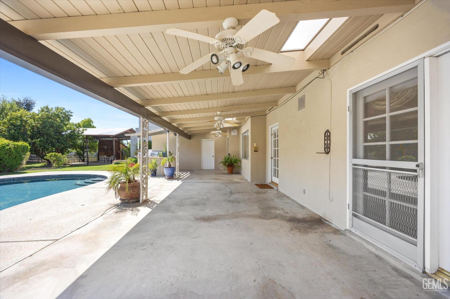 Undisclosed Address Bakersfield, CA 93313 - Photo 38 of 45 a view of a porch with a table and chairs