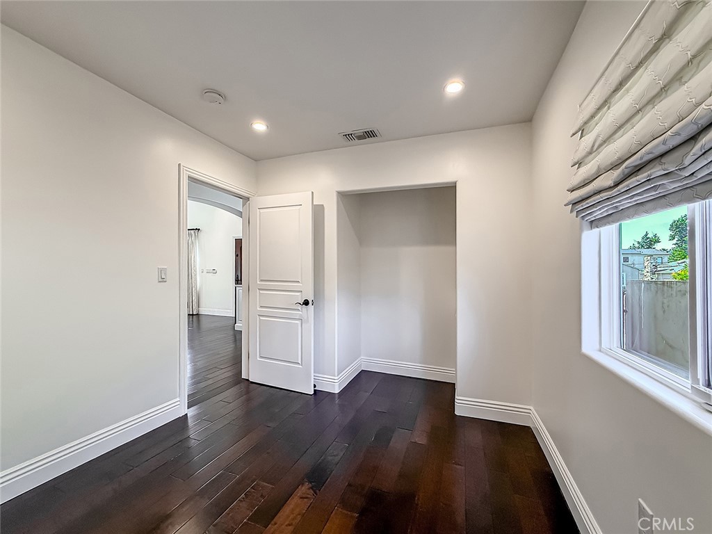 5960 Balcom Avenue Encino, CA 91316 - Photo 20 of 58 a bathroom with a sink and a mirror
