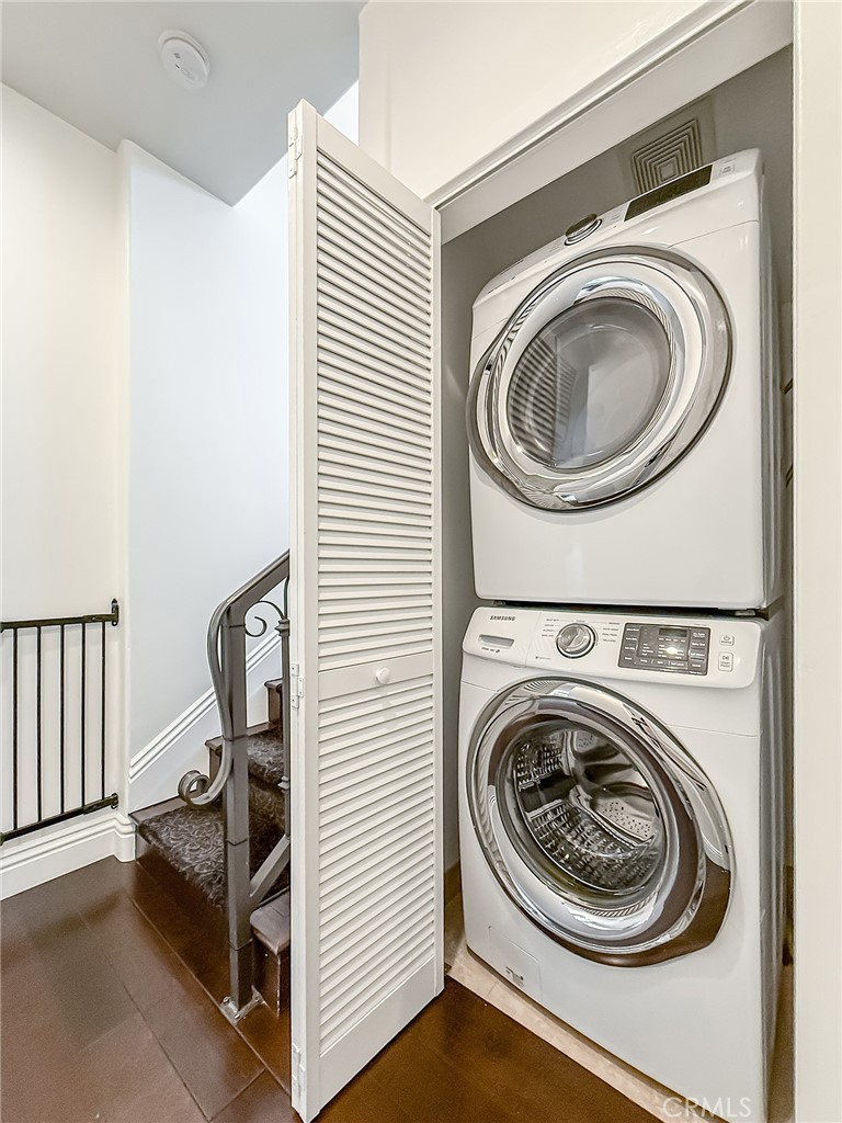 5960 Balcom Avenue Encino, CA 91316 - Photo 24 of 58 a view of a hallway with washer and dryer