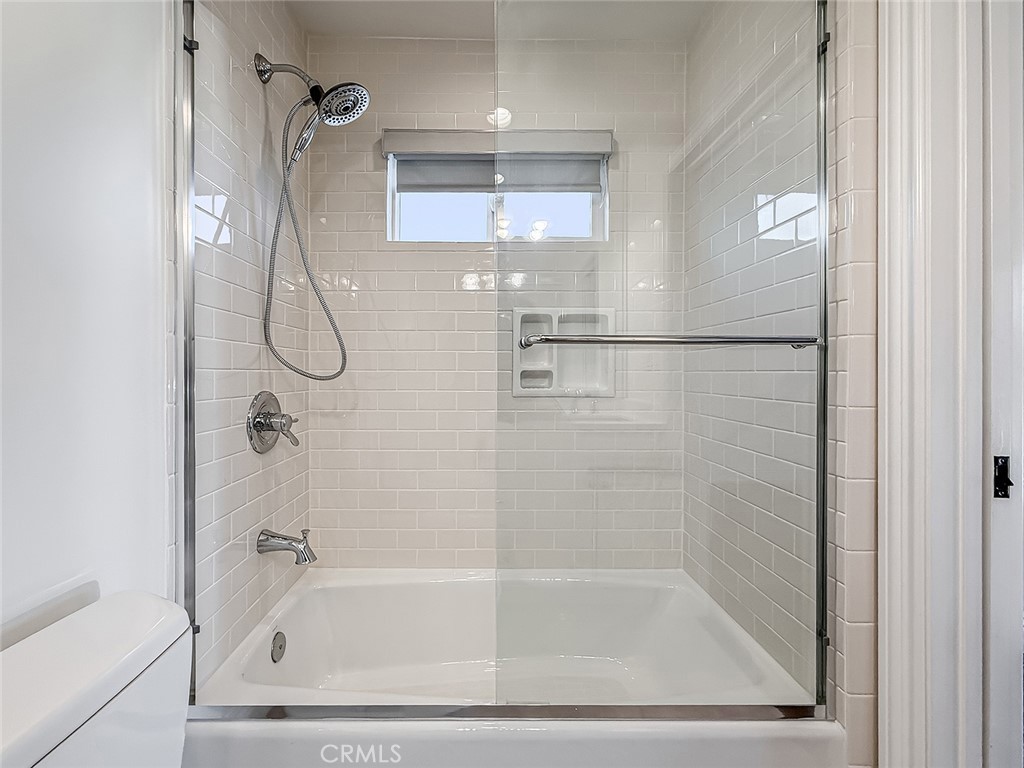 5960 Balcom Avenue Encino, CA 91316 - Photo 29 of 58 a bath tub sitting next to a shower