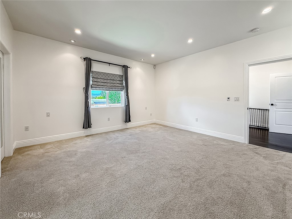 5960 Balcom Avenue Encino, CA 91316 - Photo 45 of 58 an empty room with windows