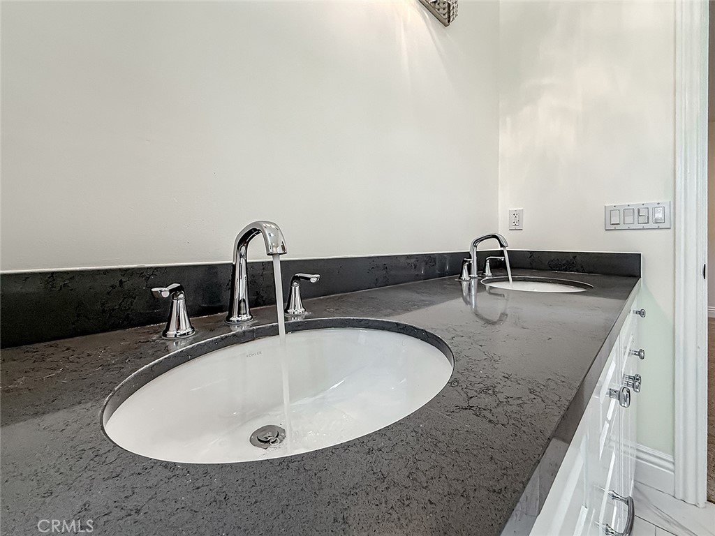 5960 Balcom Avenue Encino, CA 91316 - Photo 48 of 58 a close view of sink and tap
