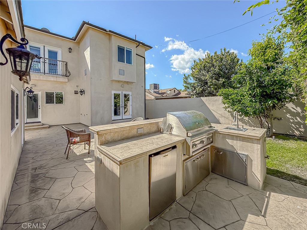 5960 Balcom Avenue Encino, CA 91316 - Photo 52 of 58 a view of a kitchen with furniture and outdoor space