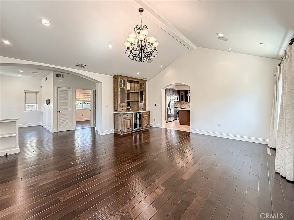 5960 Balcom Avenue Encino, CA 91316 - Photo 6 of 58 an empty room with wooden floor and windows