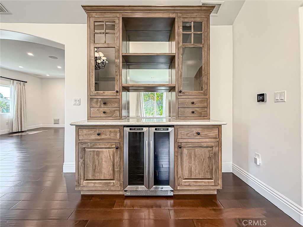 5960 Balcom Avenue Encino, CA 91316 - Photo 8 of 58 a kitchen with stainless steel appliances a refrigerator and a stove