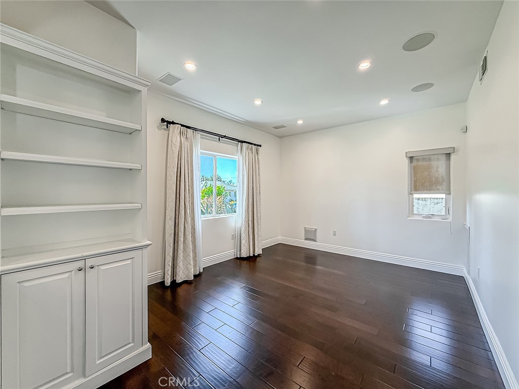 5960 Balcom Avenue Encino, CA 91316 - Photo 10 of 58 a view of a room with wooden floor and window