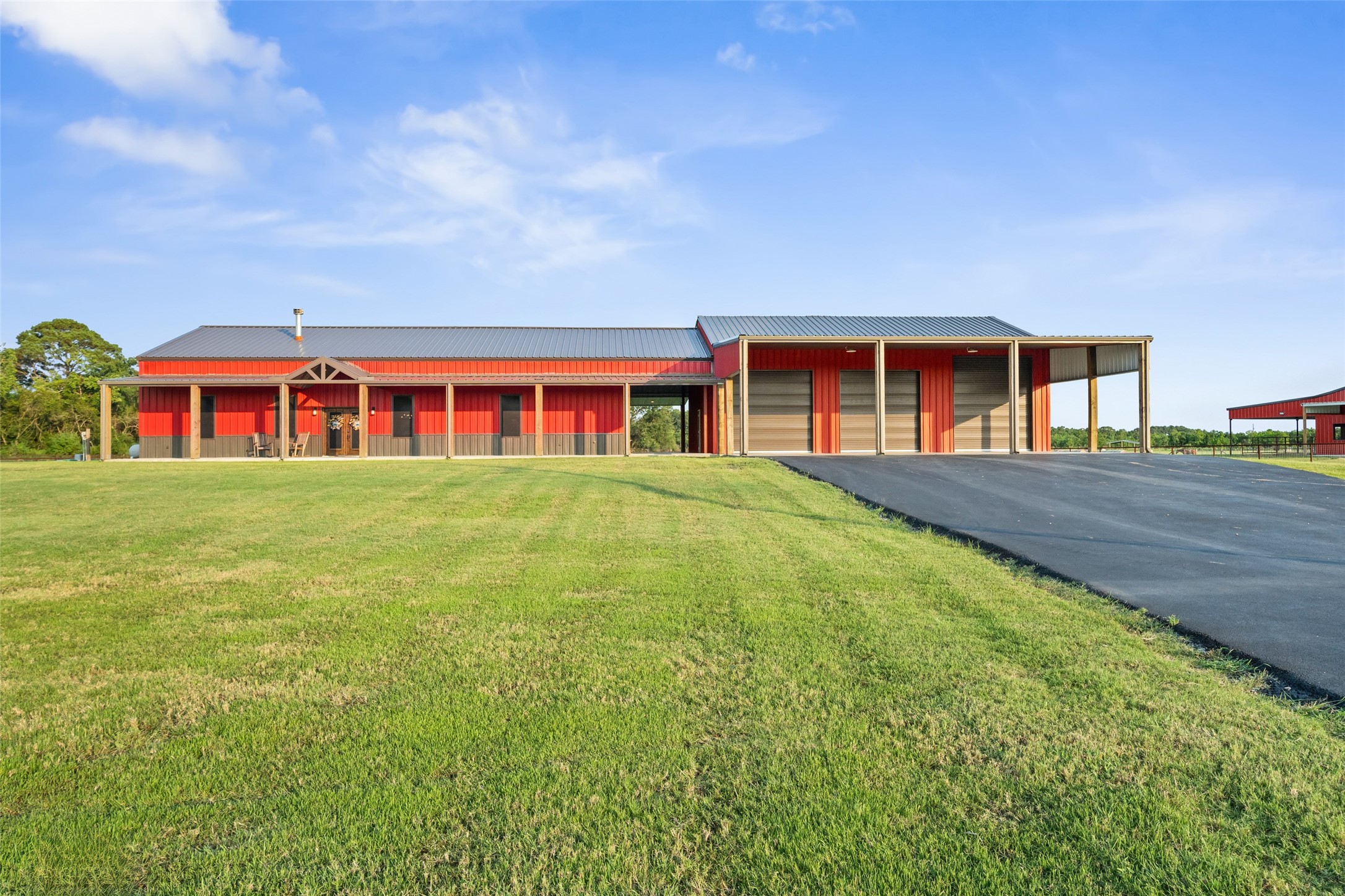 1402 Eagle Ferry Road Anahuac, TX 77514 - Photo 15 of 48 a view of a house with a big yard
