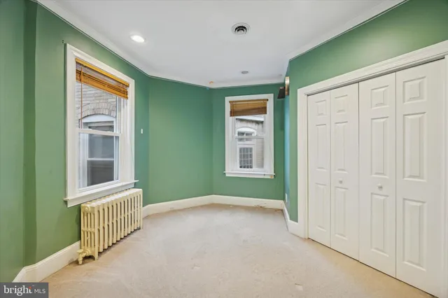 en empty room with windows