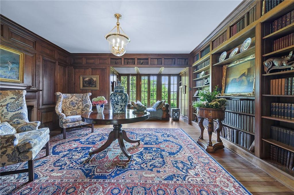 526 Scaife Road Sewickley, PA 15143 - Photo 14 of 50 a living room with furniture a rug a chandelier and a book shelf