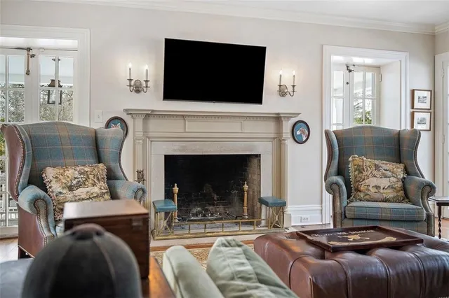 a view of house with outdoor seating space