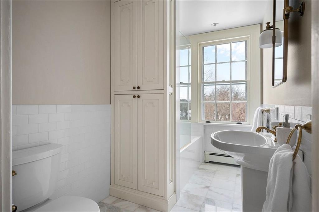 526 Scaife Road Sewickley, PA 15143 - Photo 32 of 50 a bathroom with a sink a toilet and tub