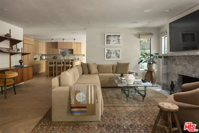 a view of a patio with chairs and tables