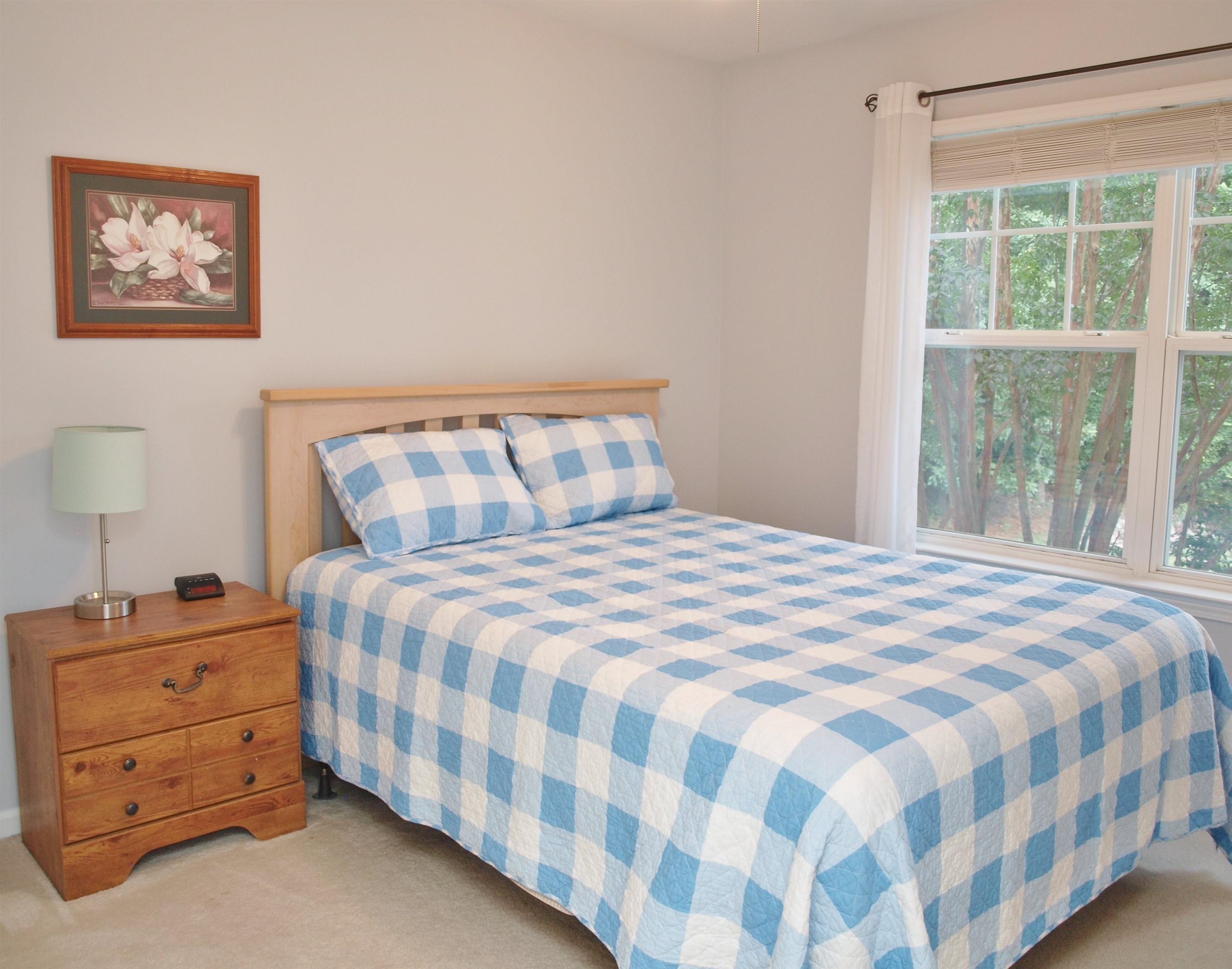 11259 Lofty Heights Place Raleigh, NC 27614 - Photo 12 of 18 a bedroom with a bed and a window