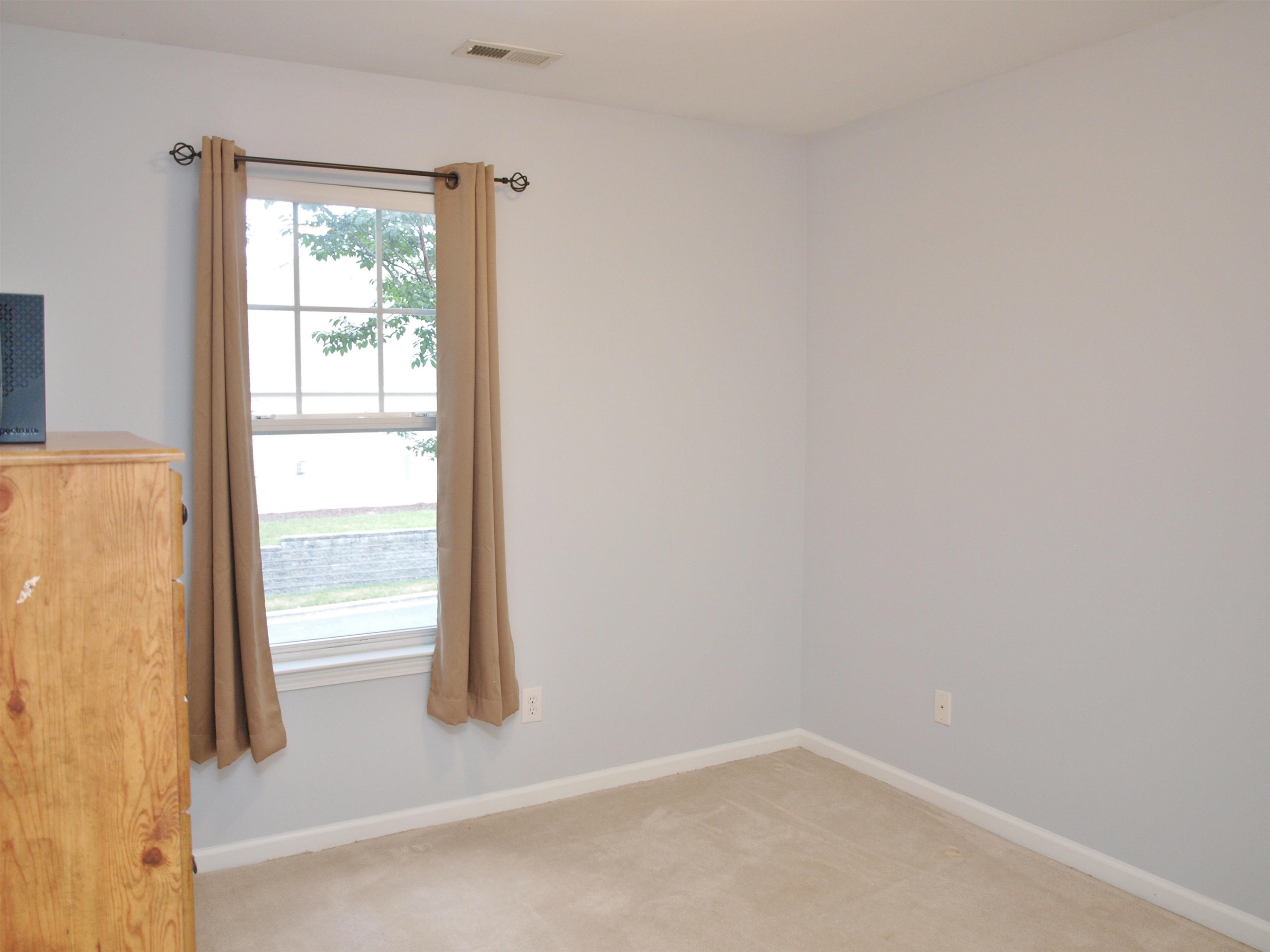 11259 Lofty Heights Place Raleigh, NC 27614 - Photo 13 of 18 an empty room with windows