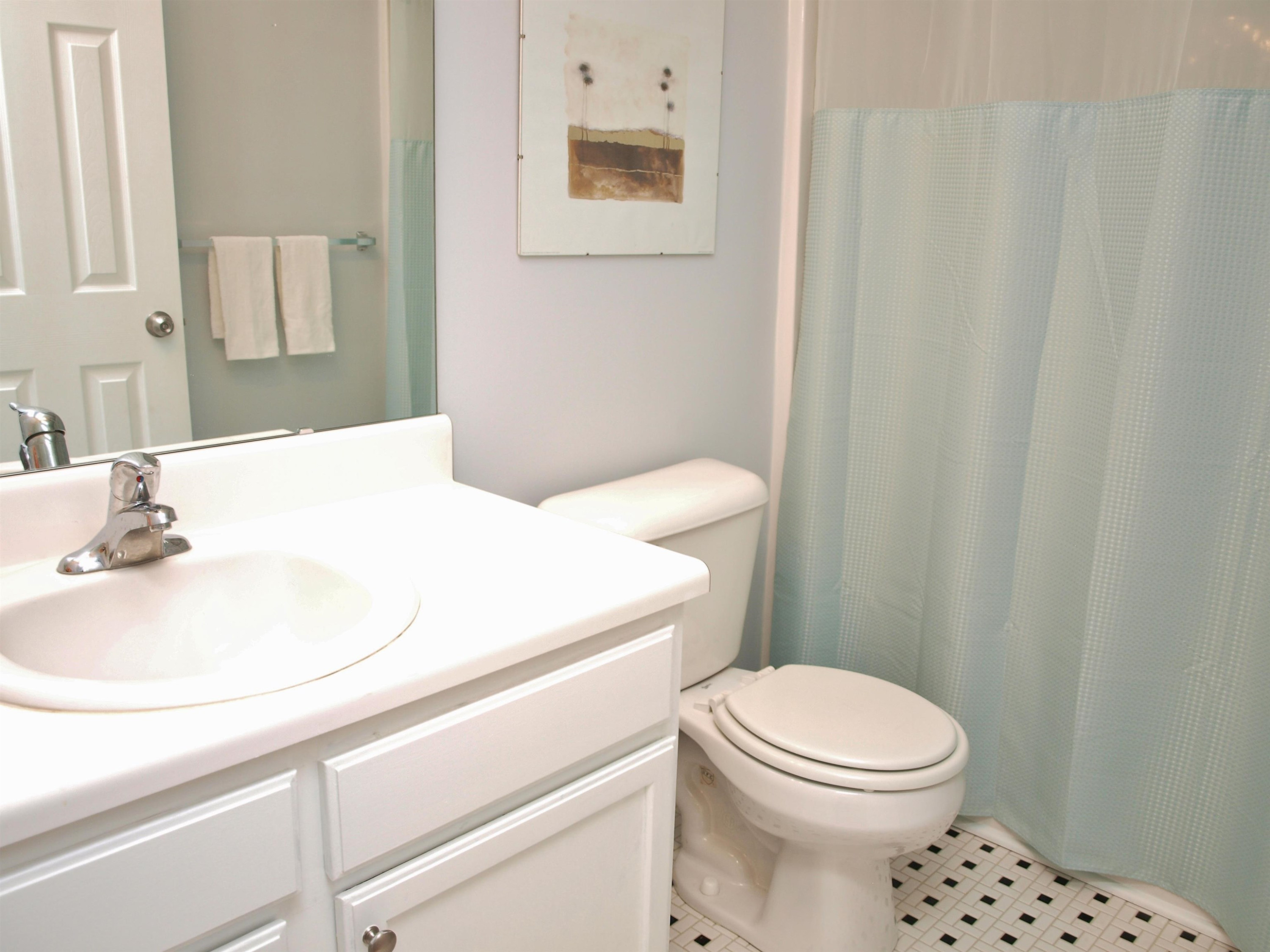 11259 Lofty Heights Place Raleigh, NC 27614 - Photo 14 of 18 a bathroom with a sink a toilet and vanity