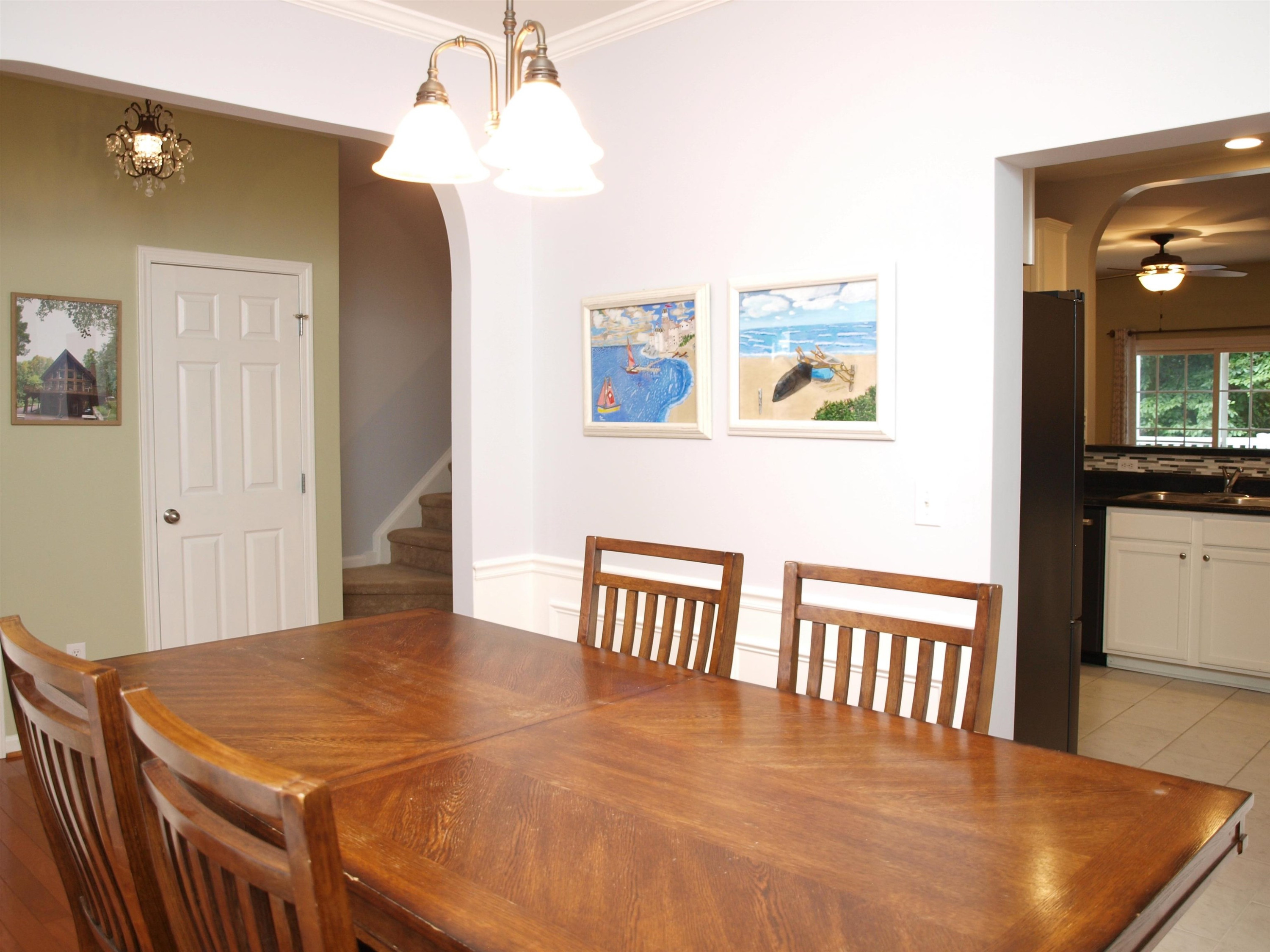 11259 Lofty Heights Place Raleigh, NC 27614 - Photo 3 of 18 a dining room with wooden floor