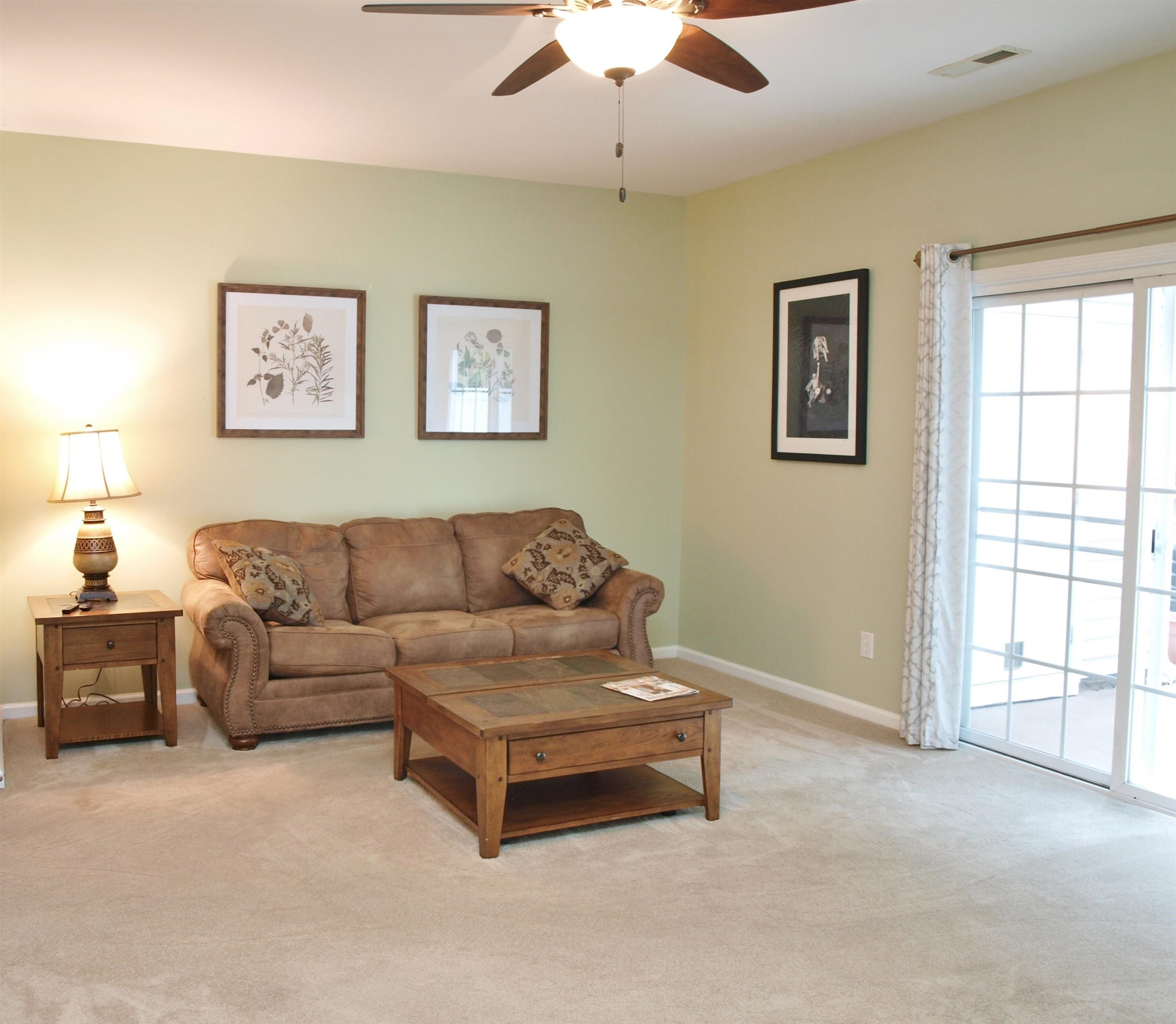 11259 Lofty Heights Place Raleigh, NC 27614 - Photo 8 of 18 a living room with furniture and a window