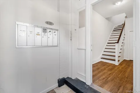a view of a hallway with staircase