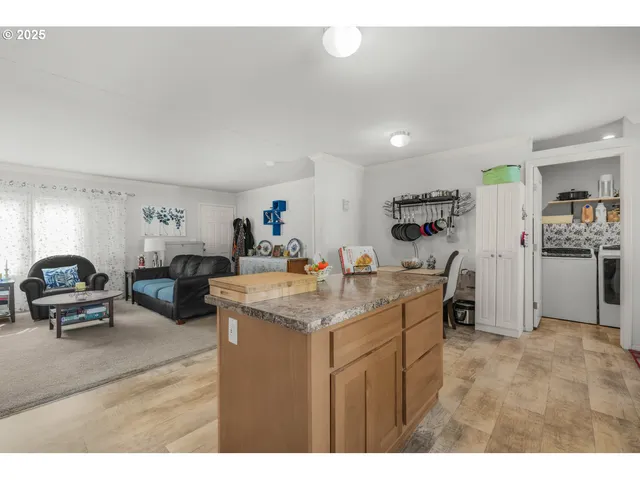 a table and chairs in a kitchen