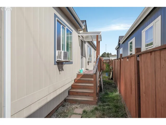 a view of a street with a parked car