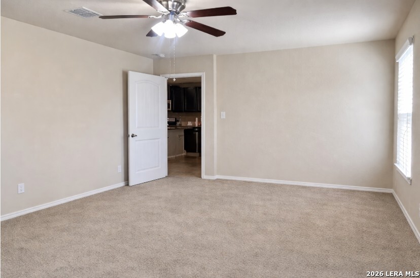 6024 Harvest Ranch San Antonio, TX 78244 - Photo 11 of 31 an empty room with closet and a ceiling fan