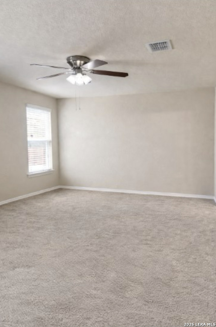 6024 Harvest Ranch San Antonio, TX 78244 - Photo 12 of 31 a view of an empty room with a window