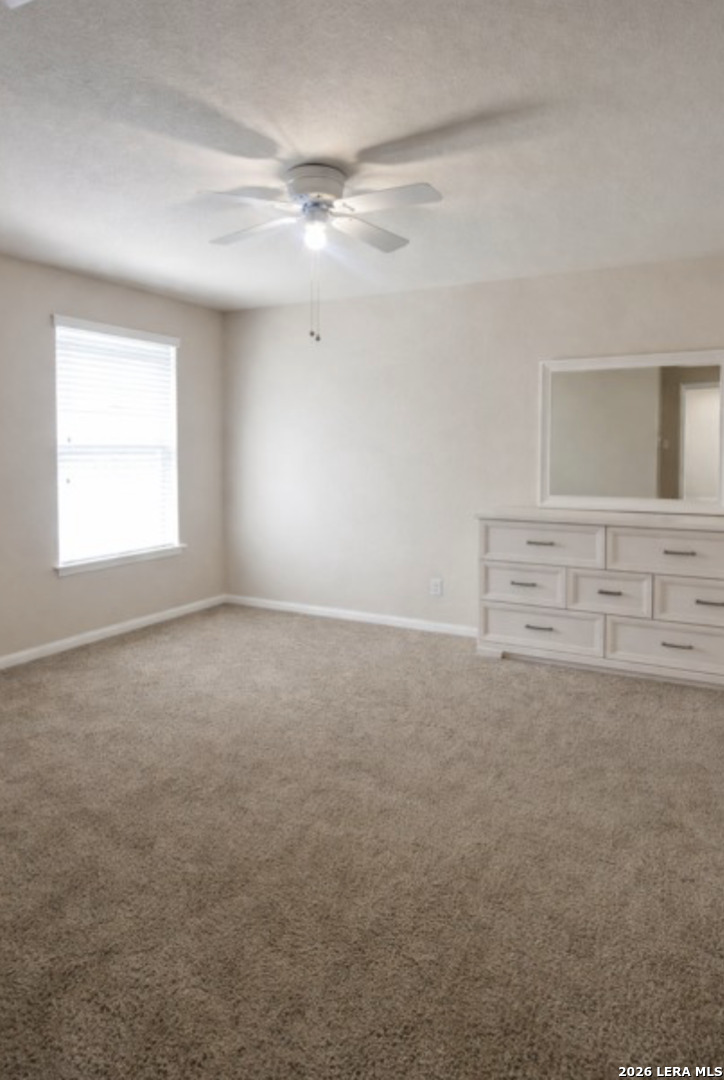 6024 Harvest Ranch San Antonio, TX 78244 - Photo 23 of 31 a view of an empty room with a window