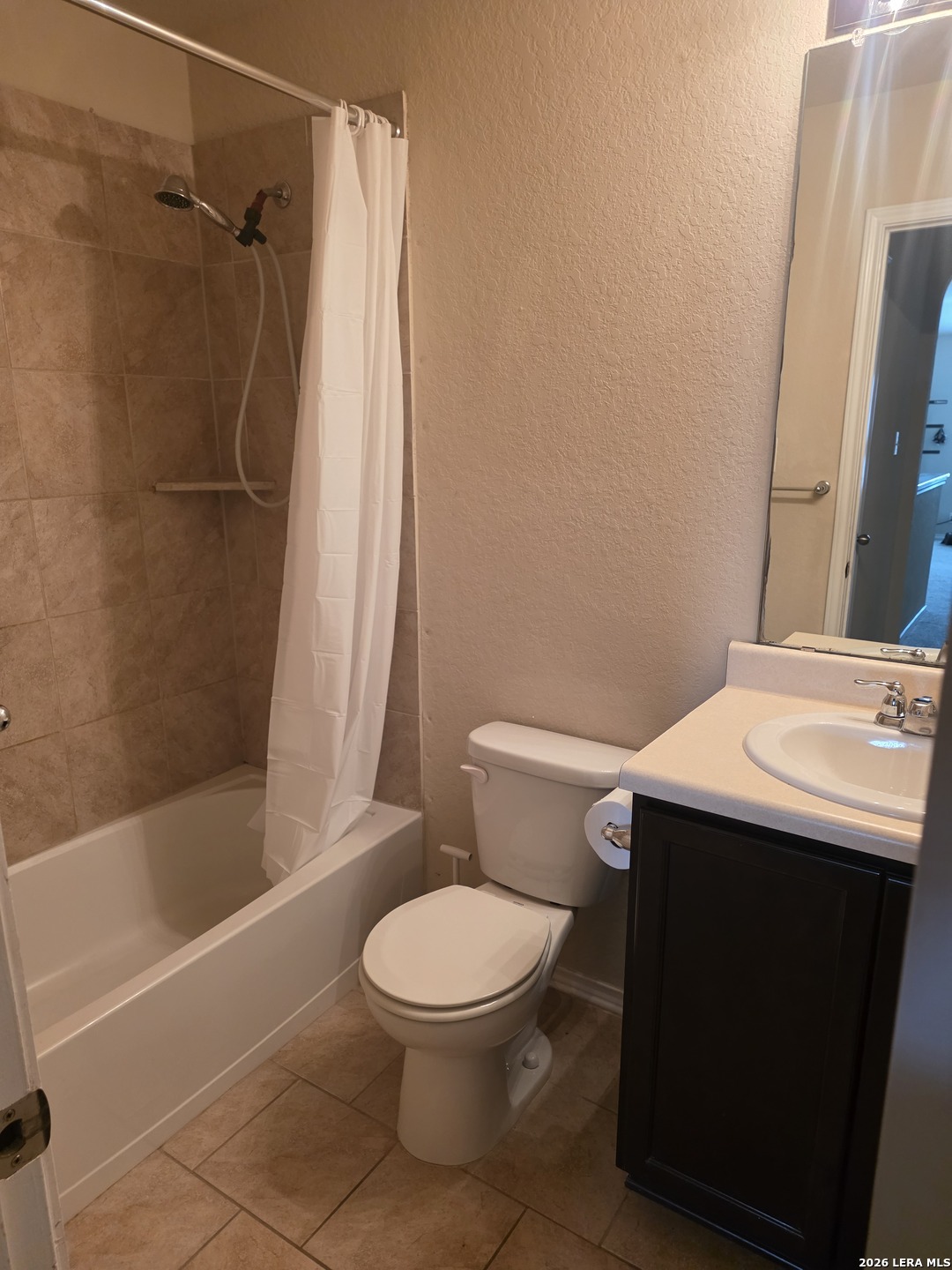 6024 Harvest Ranch San Antonio, TX 78244 - Photo 25 of 31 a bathroom with a sink a toilet and shower