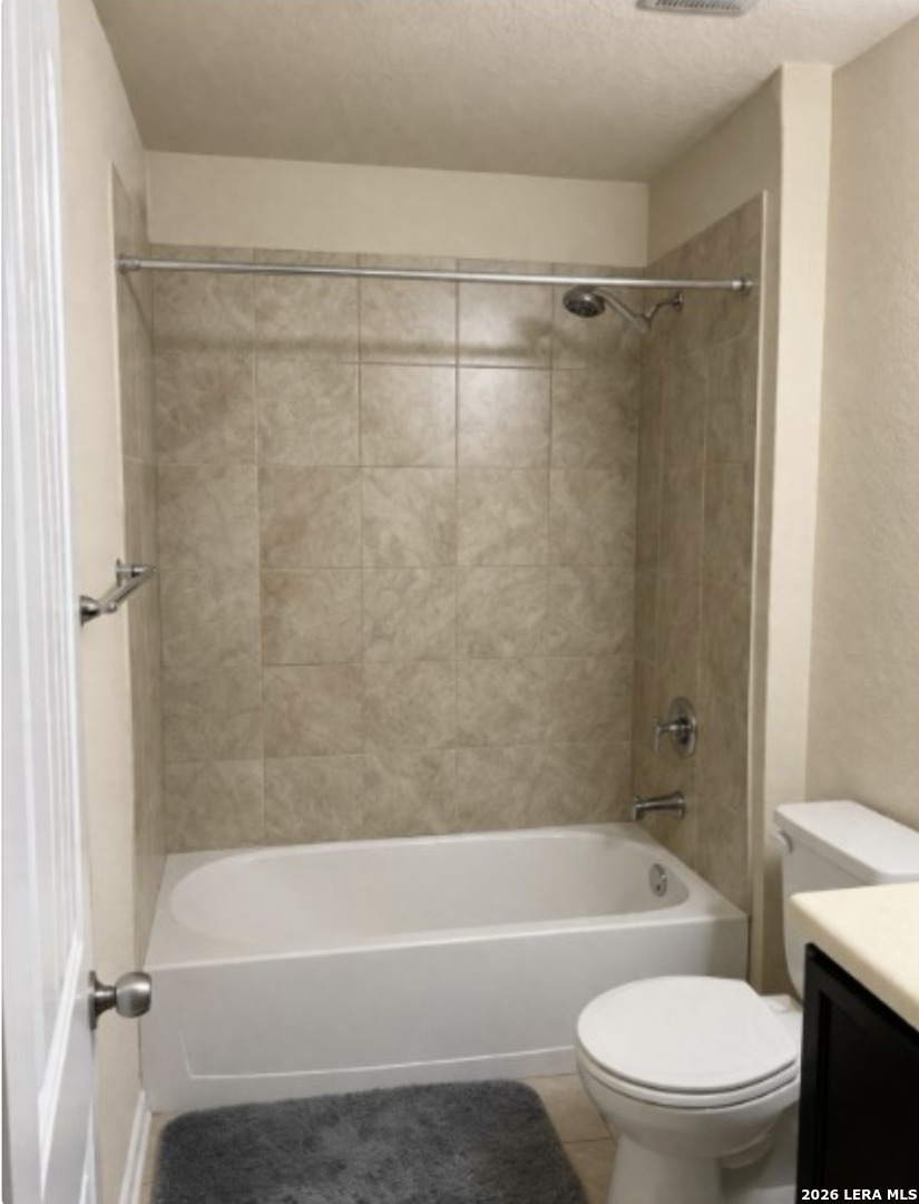6024 Harvest Ranch San Antonio, TX 78244 - Photo 26 of 31 a bathroom with a toilet and a bath tub