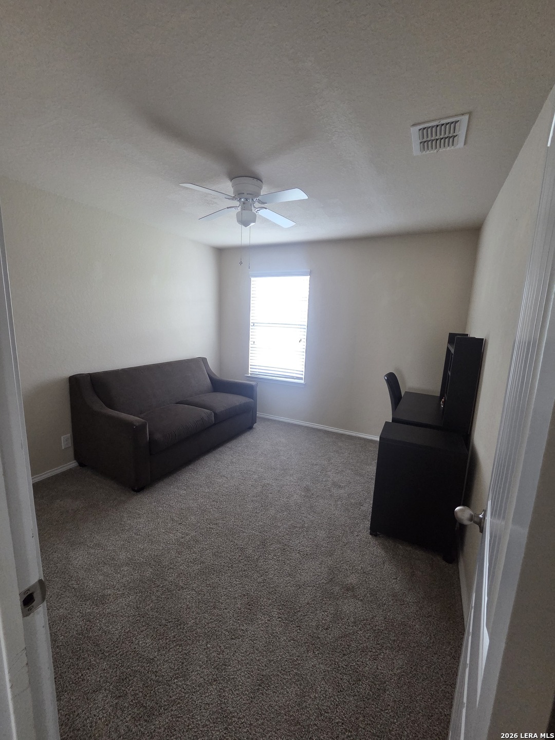6024 Harvest Ranch San Antonio, TX 78244 - Photo 29 of 31 a room with furniture and window