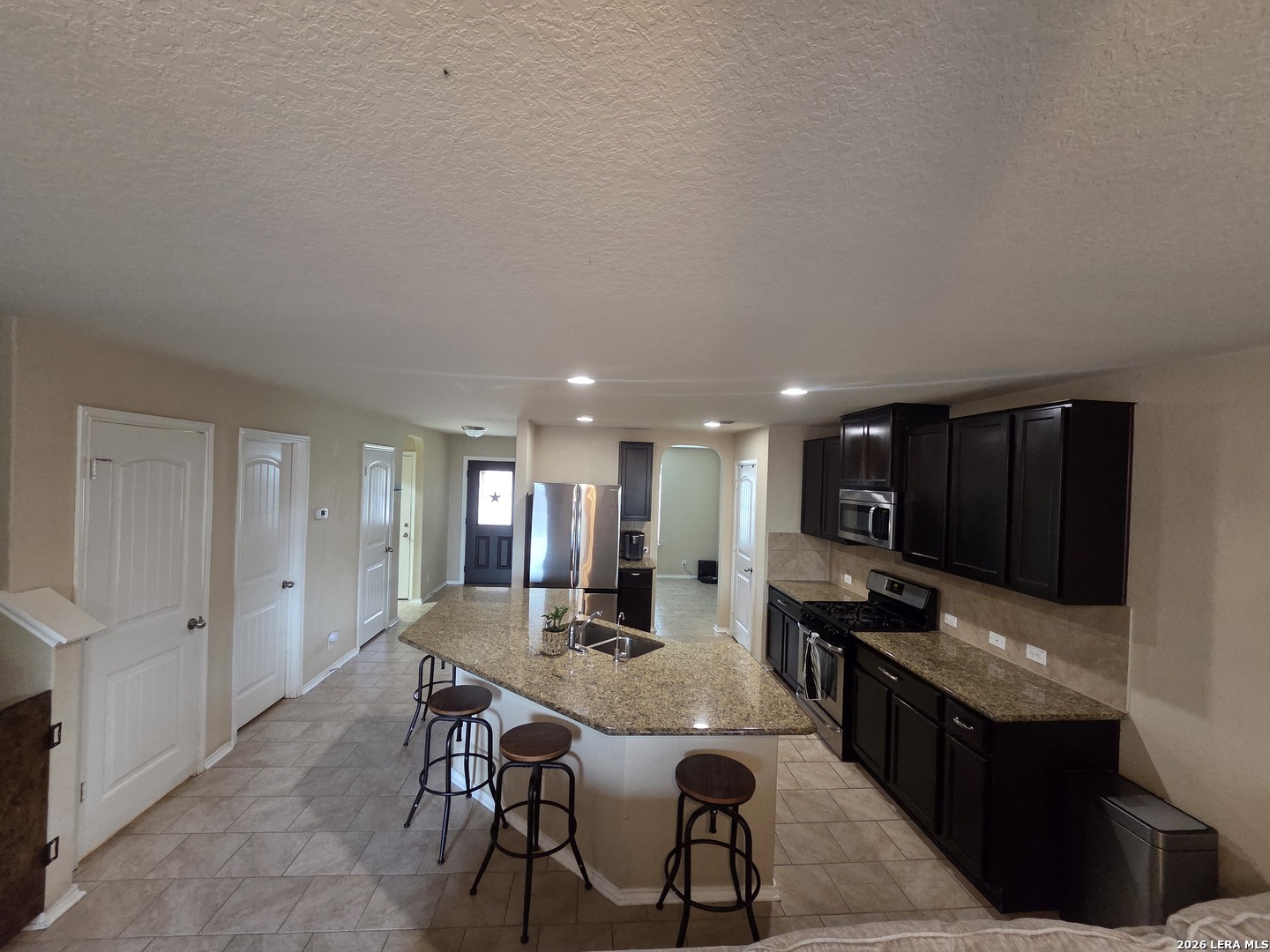6024 Harvest Ranch San Antonio, TX 78244 - Photo 4 of 31 a kitchen with a table and chairs in it