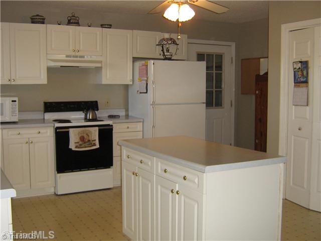234 Allen Road Mocksville, NC 27028 - Photo 6 of 16 Kitchen. Kitchen island allows for more storage space or just the counter top to display the home-cooked meals