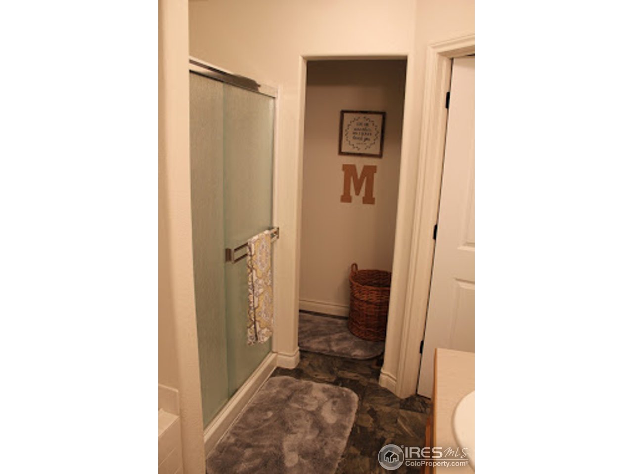 2259 80th Avenue Greeley, CO 80634 - Photo 11 of 21 a bathroom with a sink and a toilet