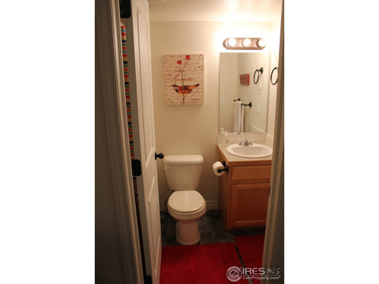 2259 80th Avenue Greeley, CO 80634 - Photo 17 of 21 a bathroom with a toilet and a shower