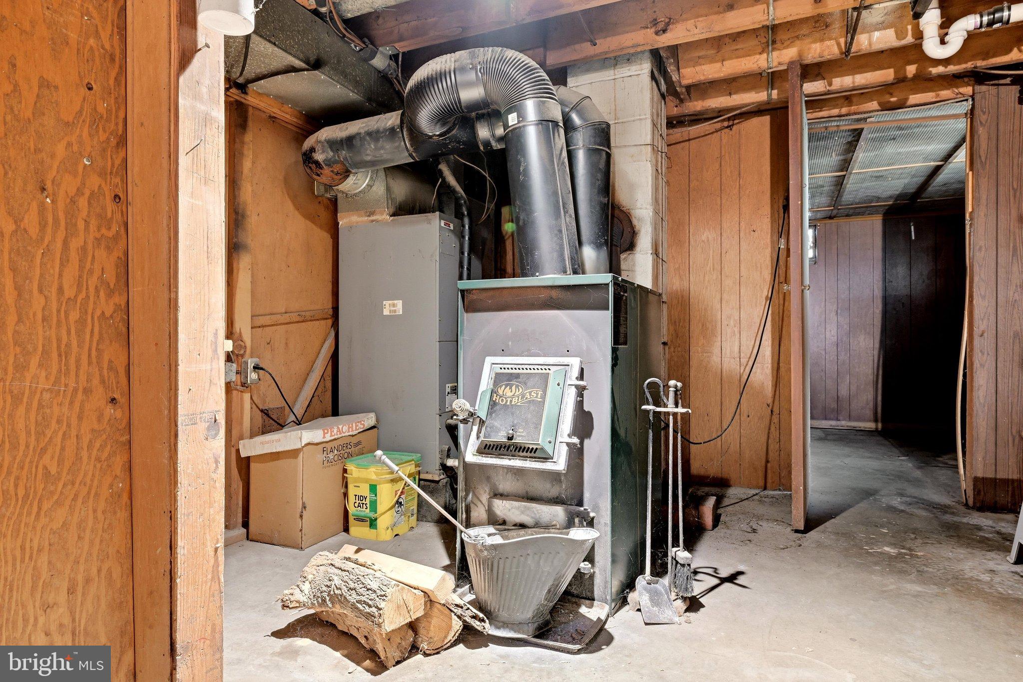 2310 Senseny Road Winchester, VA 22602 - Photo 35 of 59 Basement - Wood stove connected to furnace